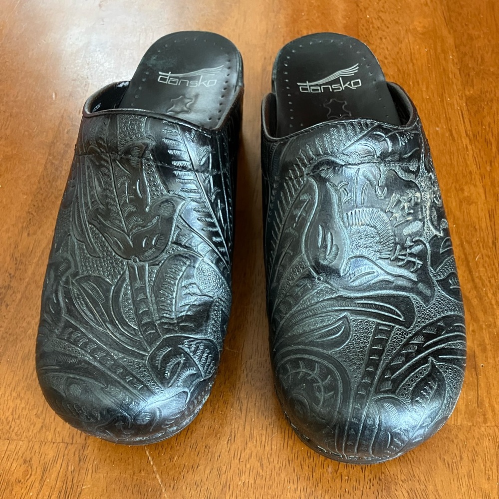 Dansko clogs black with paisley design/ 37 /scuff on right foot entry-see photo